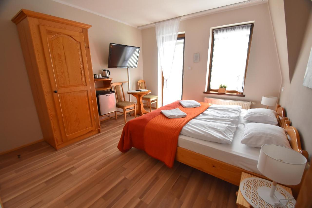 Aparthotel Mikołajki Buitenkant foto