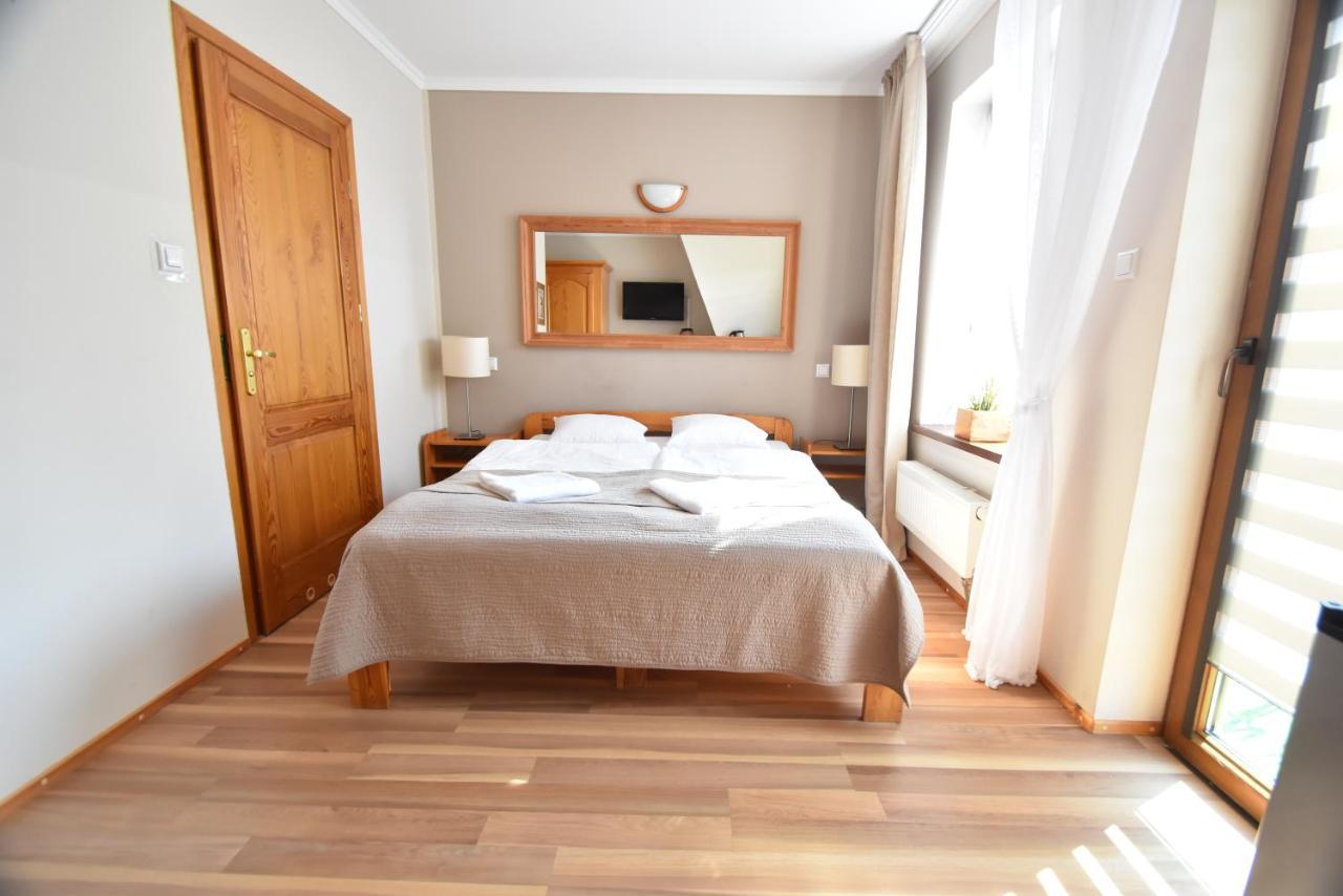 Aparthotel Mikołajki Buitenkant foto