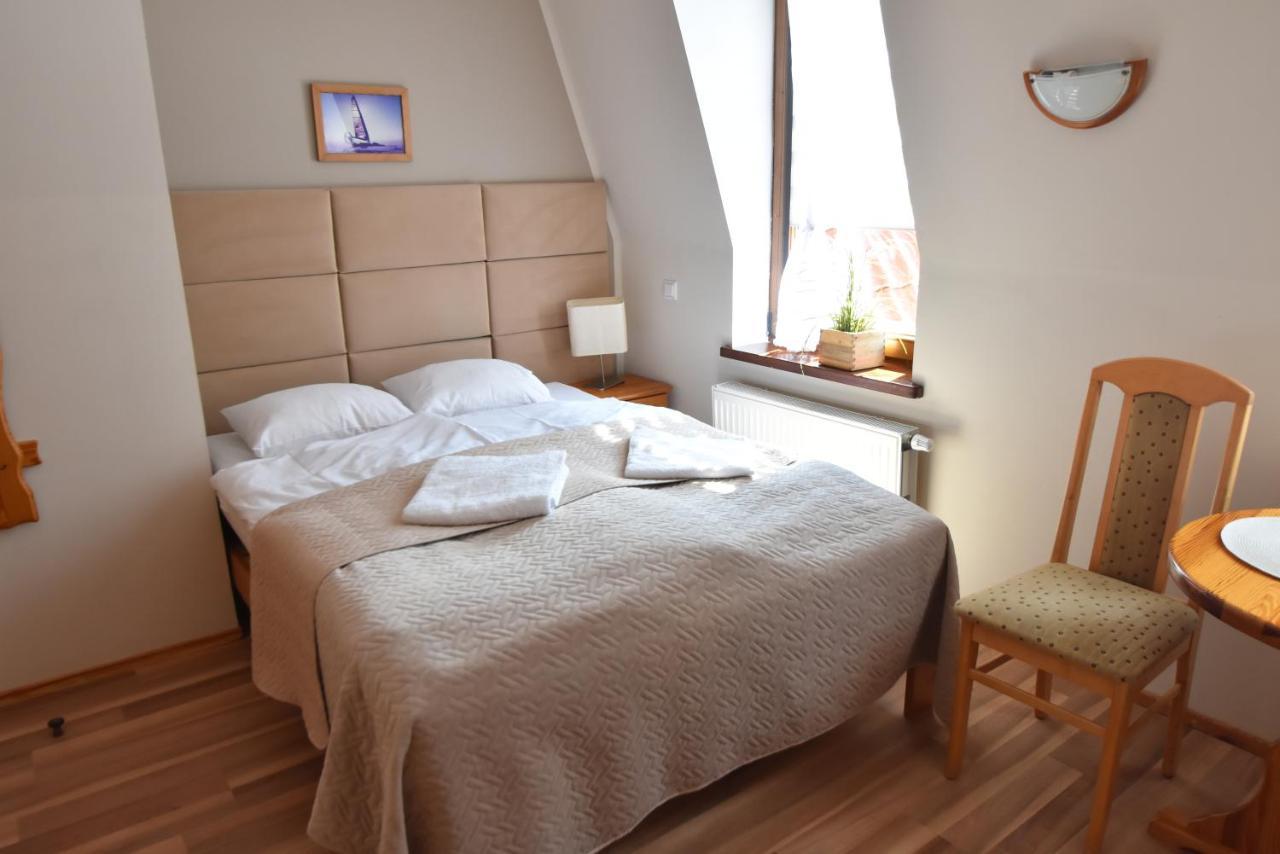 Aparthotel Mikołajki Buitenkant foto